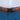 Brown belt with black buckle worn by a person in blue pants and a white shirt.
