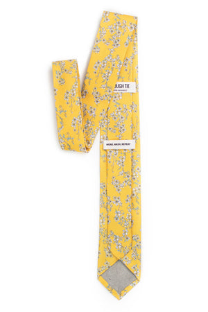 back view of yellow floral tie tough apparel
